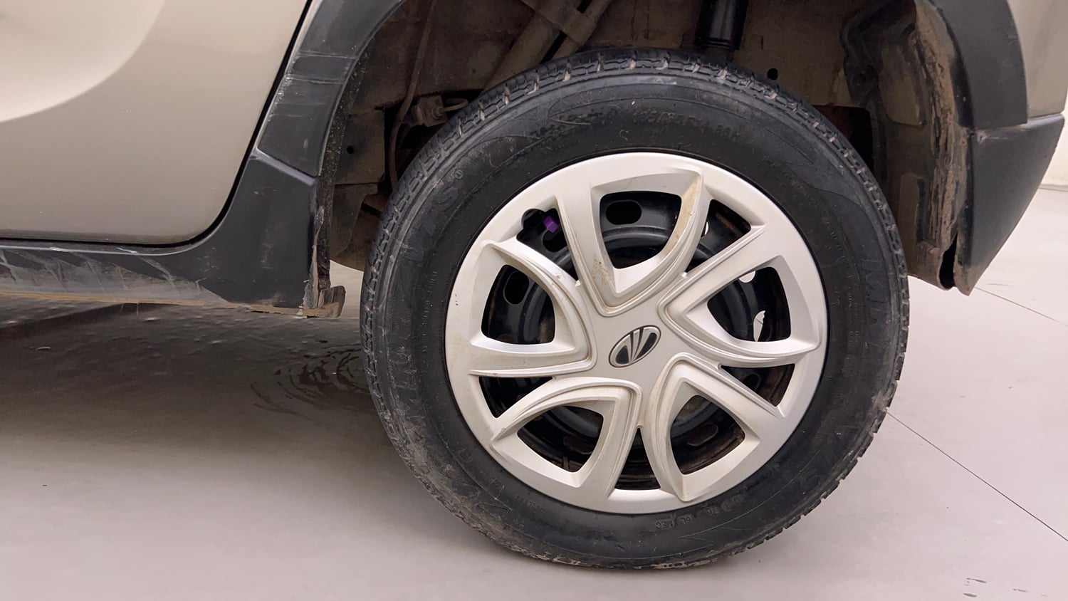 Used 2017 Mahindra KUV100 K4 6 STR Petrol Manual tyres LEFT REAR TYRE RIM VIEW