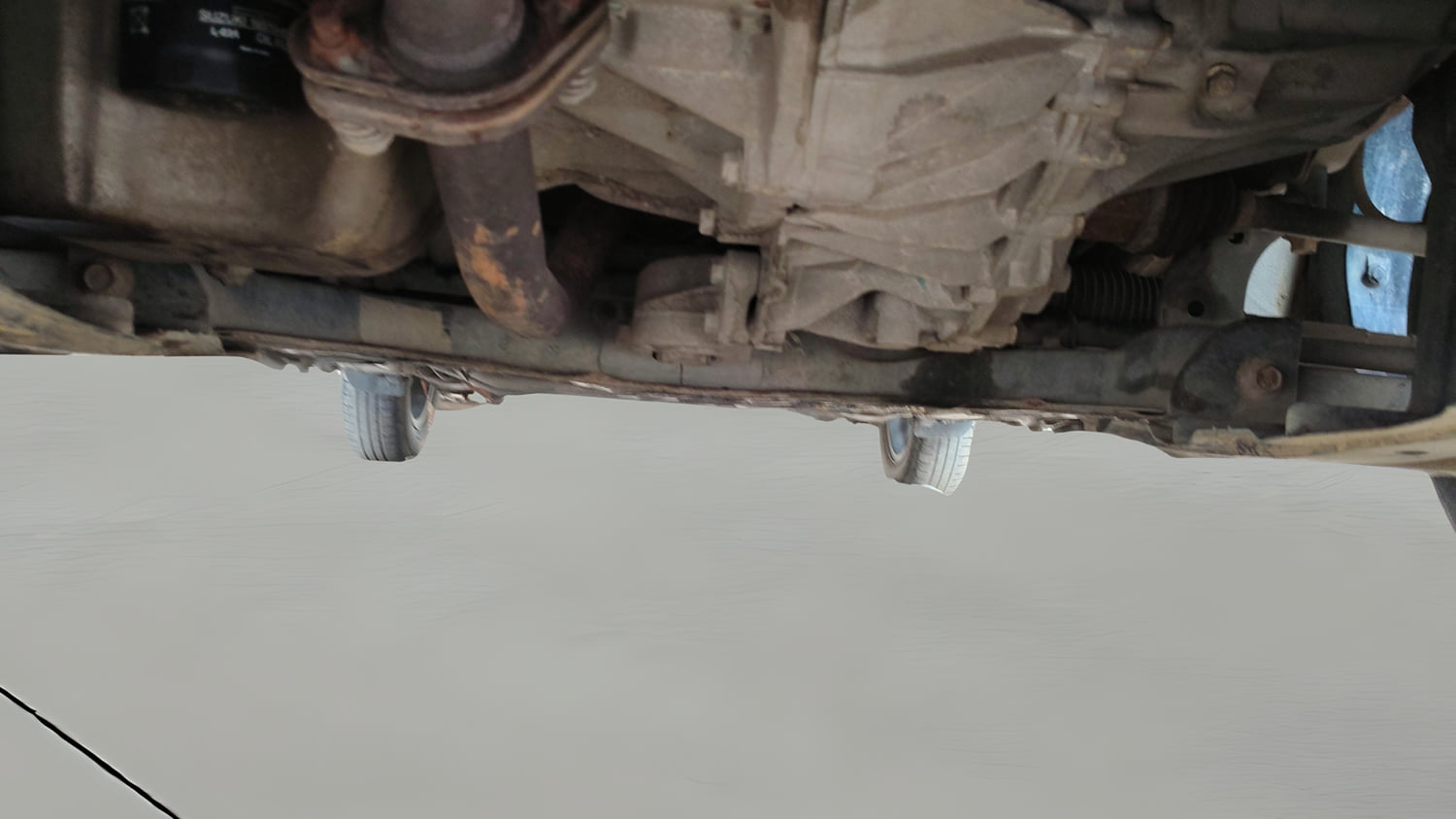 Used 2020 Maruti Suzuki Dzire VXi AMT Petrol Automatic extra FRONT LEFT UNDERBODY VIEW