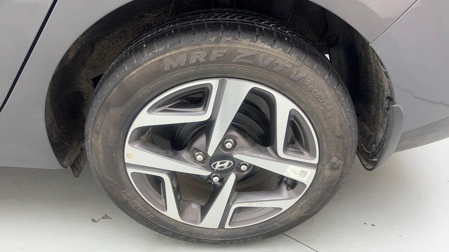 Used 2023 Hyundai Aura SX 1.2 Petrol Petrol Manual tyres LEFT REAR TYRE RIM VIEW