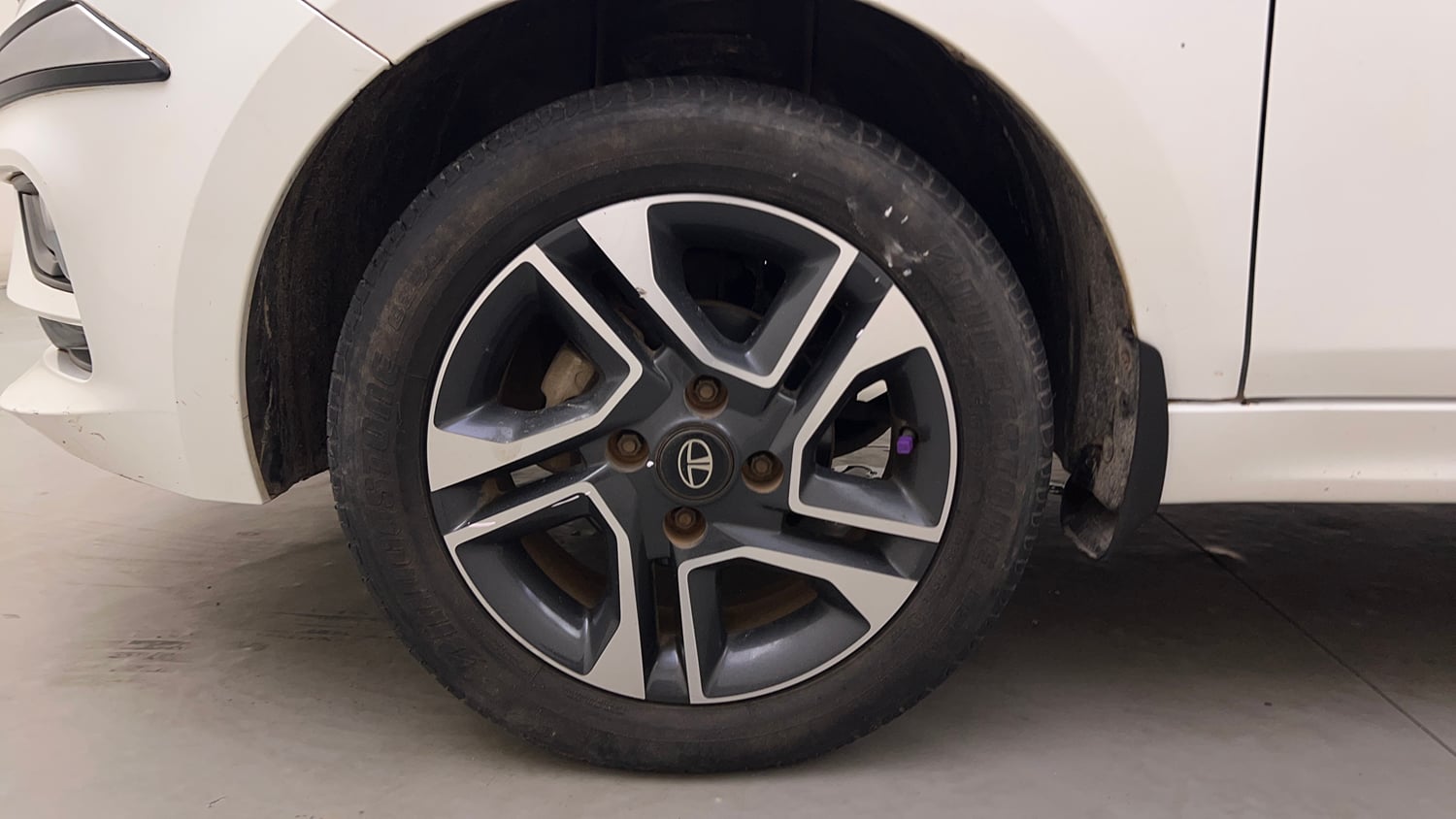 Used 2022 Tata Tiago XZA Plus Petrol Automatic tyres LEFT FRONT TYRE RIM VIEW