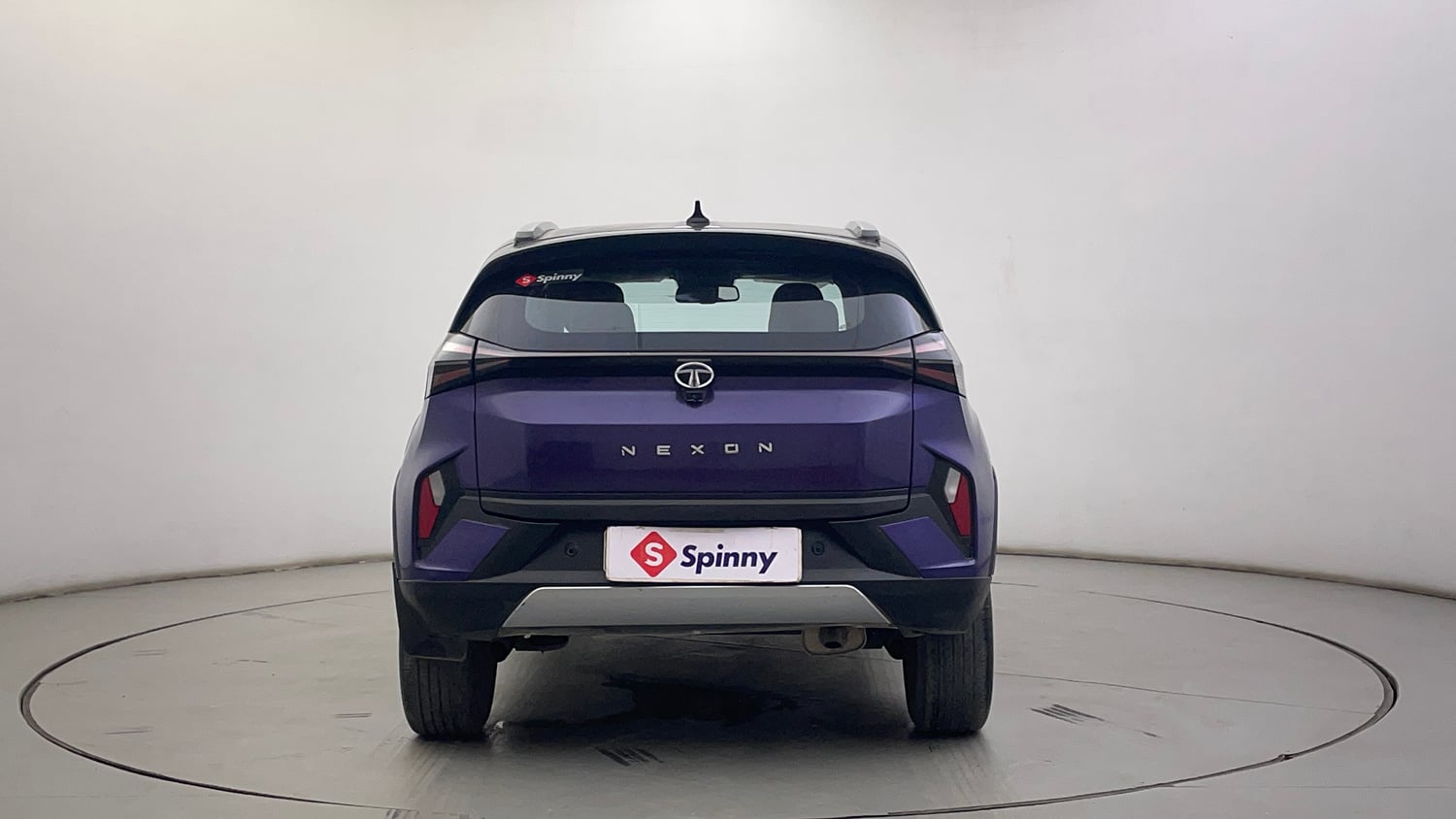 Used 2023 Tata Nexon Fearless Plus S Purple 1.2 Revotron Petrol 7DCA Dual Tone Petrol Automatic exterior BACK VIEW