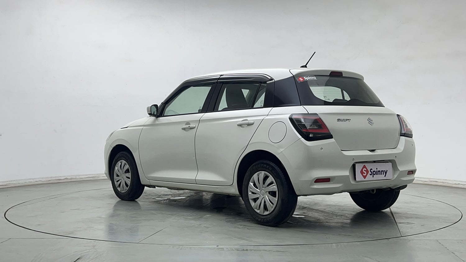 Used 2024 Maruti Suzuki Swift VXi (O) AMT Petrol Automatic exterior LEFT REAR CORNER VIEW