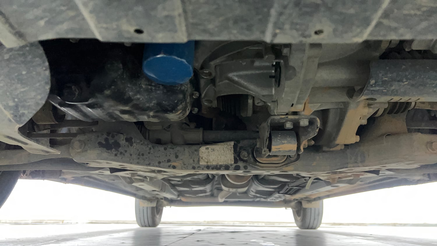 Used 2023 Hyundai Exter SX (O) 1.2 AMT Petrol Automatic extra FRONT LEFT UNDERBODY VIEW
