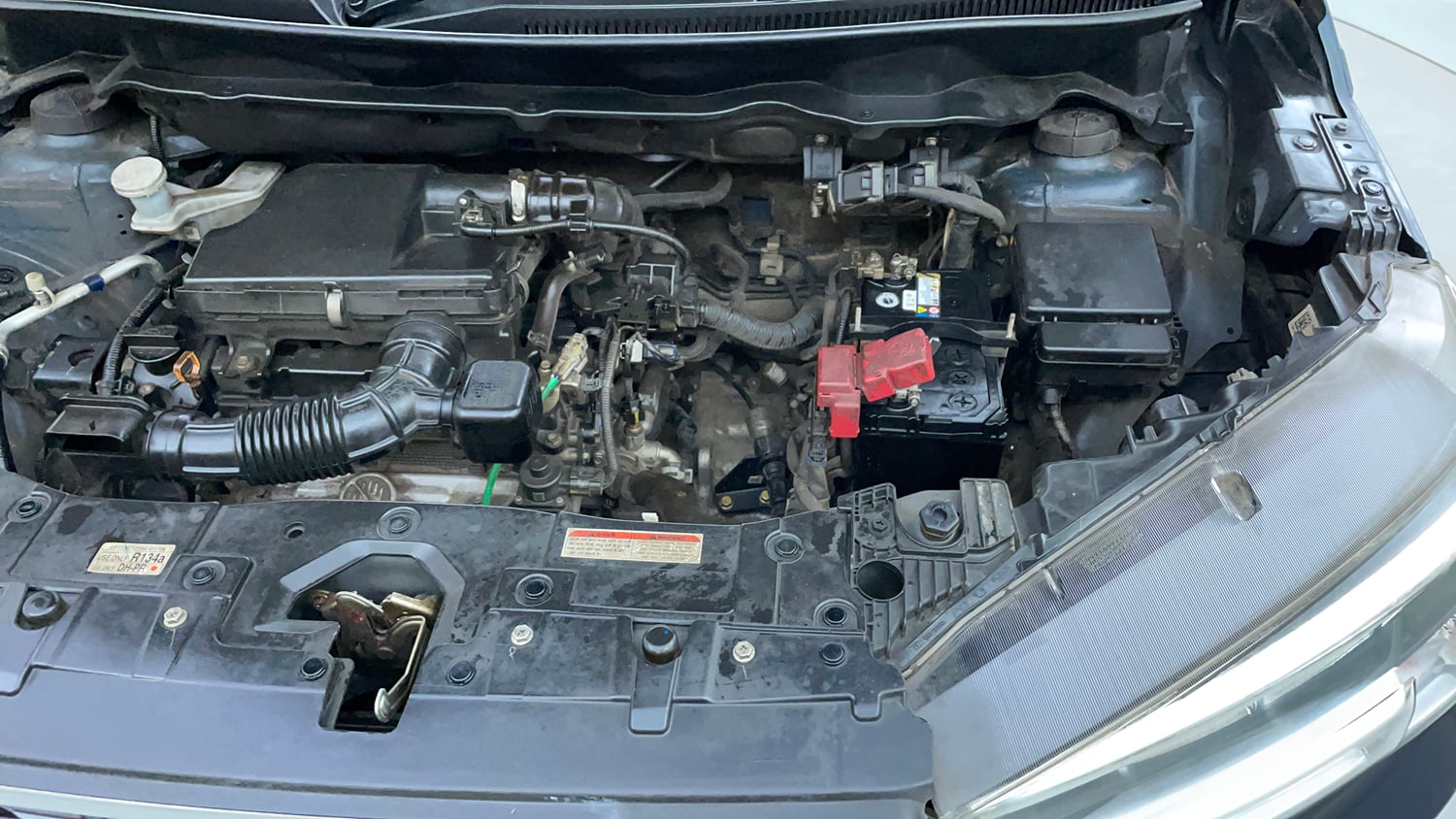 Used 2022 Maruti Suzuki XL6 Alpha Plus AT Petrol Petrol Automatic engine ENGINE LEFT SIDE VIEW