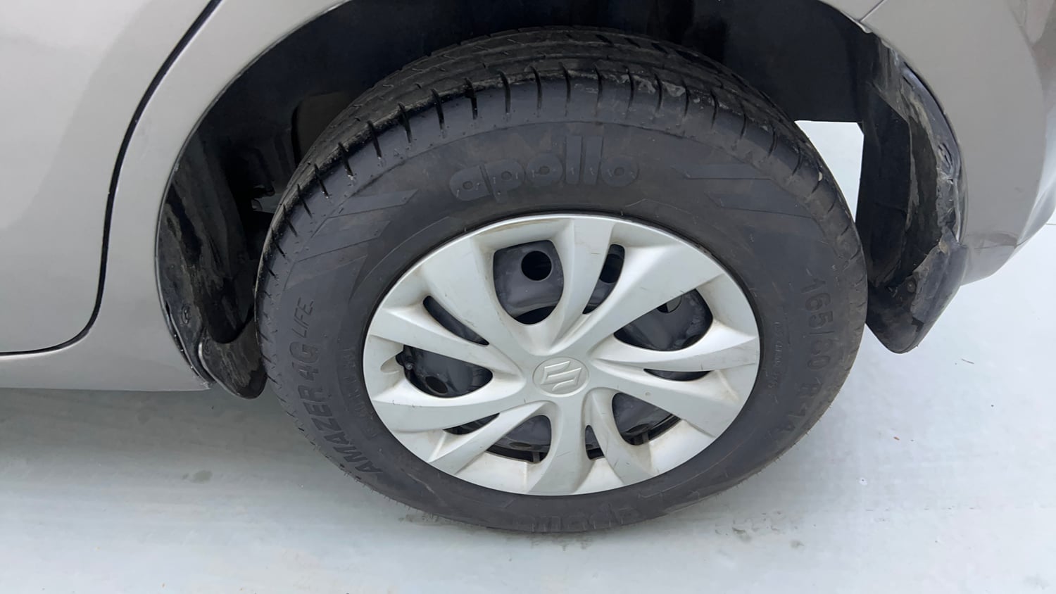 Used 2022 Maruti Suzuki Swift VXi Petrol Manual tyres LEFT REAR TYRE RIM VIEW