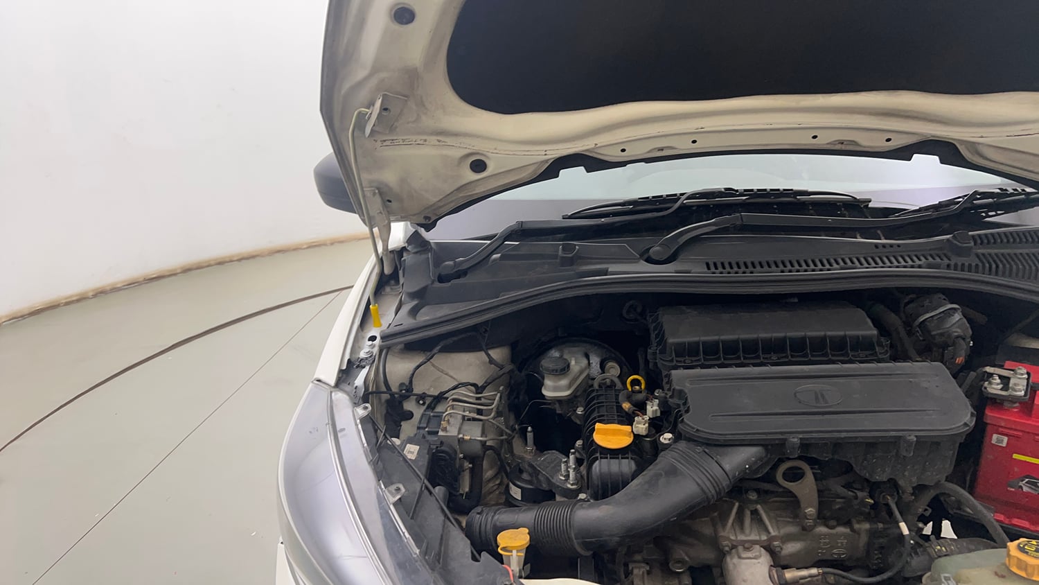Used 2021 Tata Tiago XE Petrol Manual engine ENGINE RIGHT SIDE HINGE & APRON VIEW