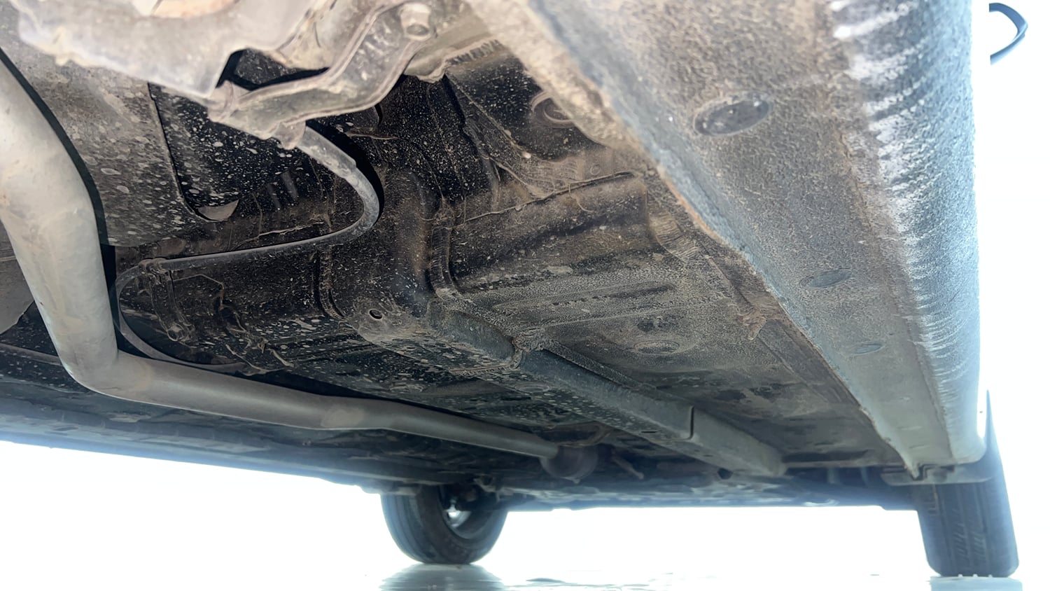 Used 2023 Hyundai Aura SX 1.2 Petrol Petrol Manual extra REAR RIGHT UNDERBODY VIEW