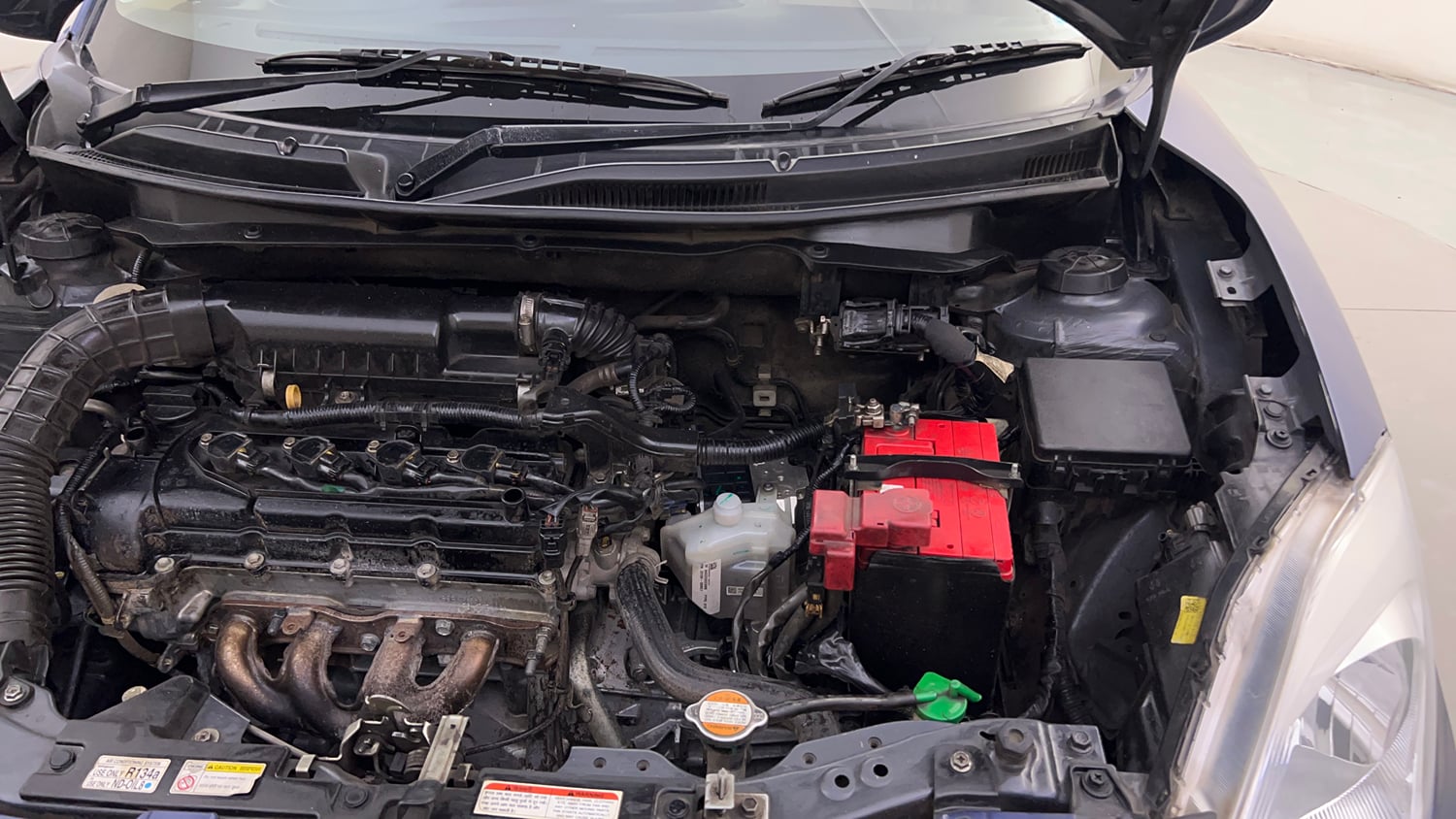 Used 2017 Maruti Suzuki Dzire VXi AMT Petrol Automatic engine ENGINE LEFT SIDE HINGE & APRON VIEW
