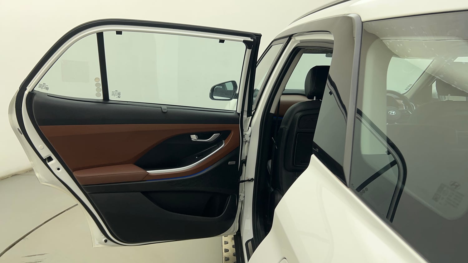 Used 2024 Hyundai Alcazar Signature (O) 7 STR 1.5 Petrol DCT Petrol Automatic interior LEFT REAR DOOR OPEN VIEW