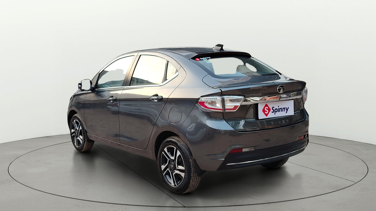 Used 2025 Tata Tigor XZ Plus LUX Petrol Manual exterior LEFT REAR CORNER VIEW