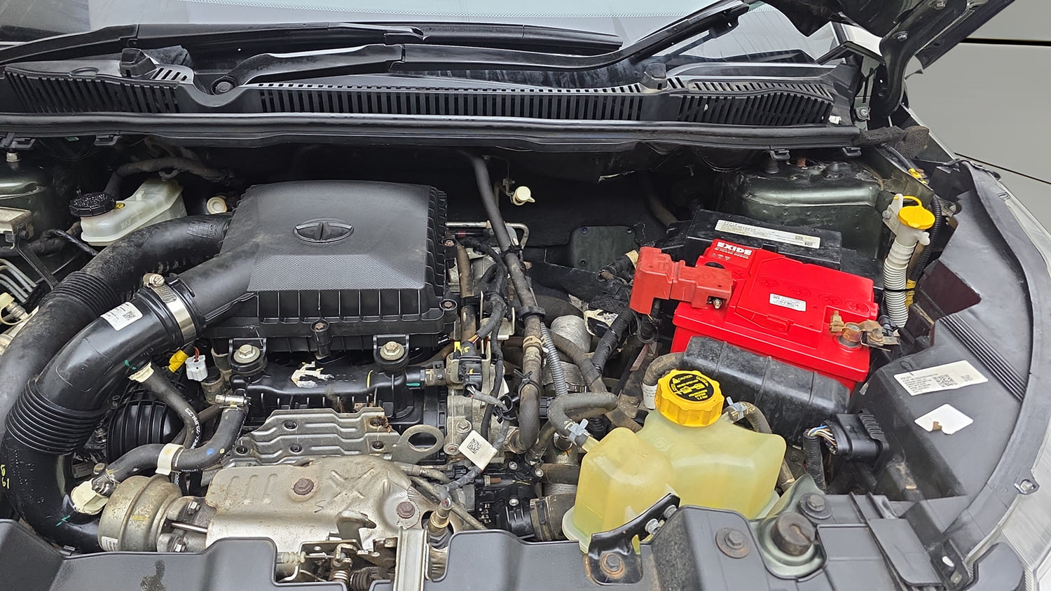 Used 2023 Tata Nexon XZ Plus LUXS Petrol Manual engine ENGINE LEFT SIDE VIEW