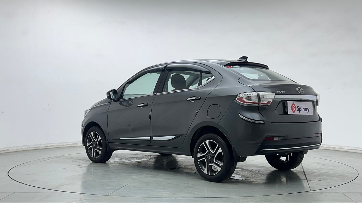 Used 2021 Tata Tigor XZ Plus Petrol Manual exterior LEFT REAR CORNER VIEW