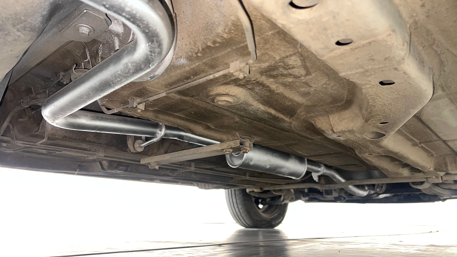 Used 2016 Tata Tiago Revotron XZ Petrol Manual extra REAR RIGHT UNDERBODY VIEW