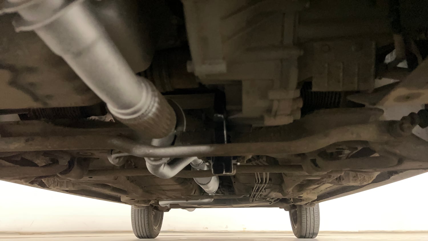 Used 2018 Tata Tigor Revotron XZA Petrol Automatic extra FRONT LEFT UNDERBODY VIEW