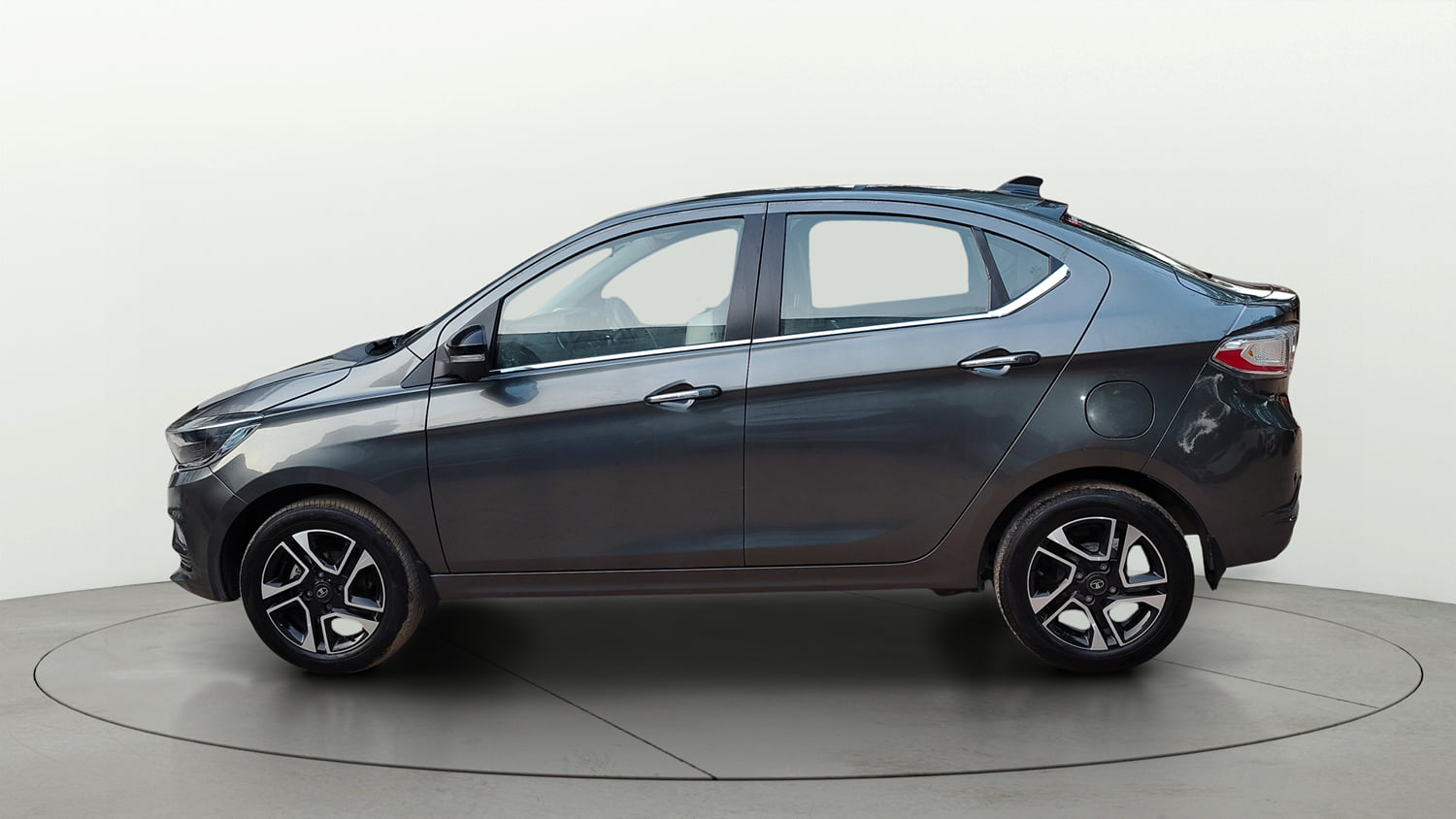 Used 2025 Tata Tigor XZ Plus LUX Petrol Manual exterior LEFT SIDE VIEW