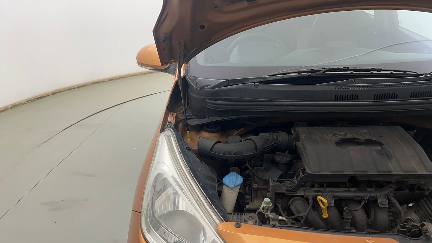 Used 2017 Hyundai Grand i10 Sportz (O) 1.2 Kappa VTVT Petrol Manual engine ENGINE RIGHT SIDE HINGE & APRON VIEW