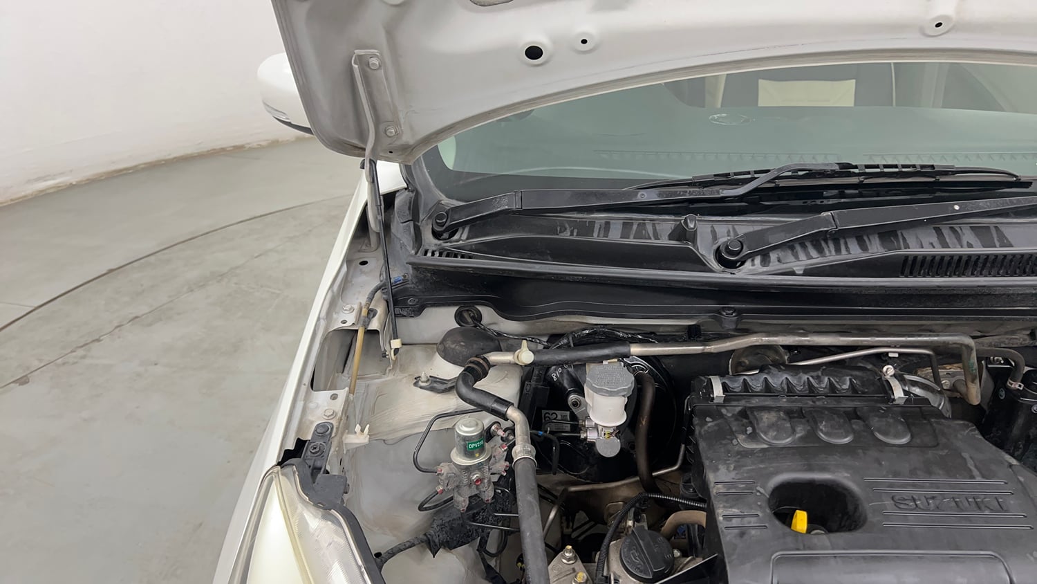 Used 2019 Maruti Suzuki Celerio ZXi AMT Petrol Automatic engine ENGINE RIGHT SIDE HINGE & APRON VIEW