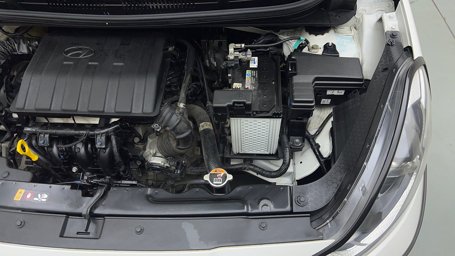 Used 2024 Hyundai Grand i10 Nios Sportz 1.2 Kappa VTVT Petrol Manual engine ENGINE LEFT SIDE VIEW