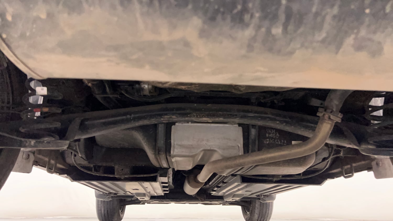 Used 2023 Maruti Suzuki Brezza Vxi AT Petrol Automatic extra REAR UNDERBODY VIEW (TAKEN FROM REAR)