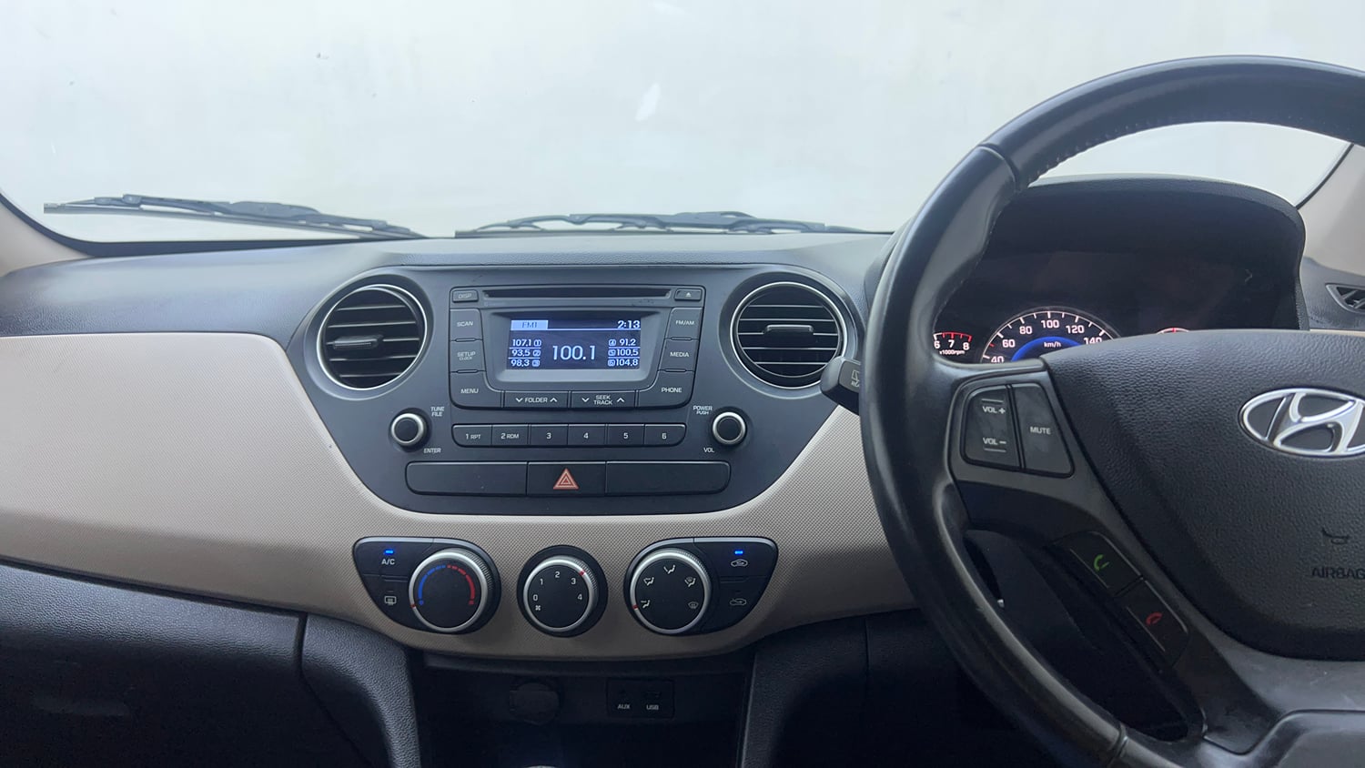 Used 2014 Hyundai Grand i10 Asta 1.2 Kappa VTVT Petrol Manual interior MUSIC SYSTEM & AC CONTROL VIEW