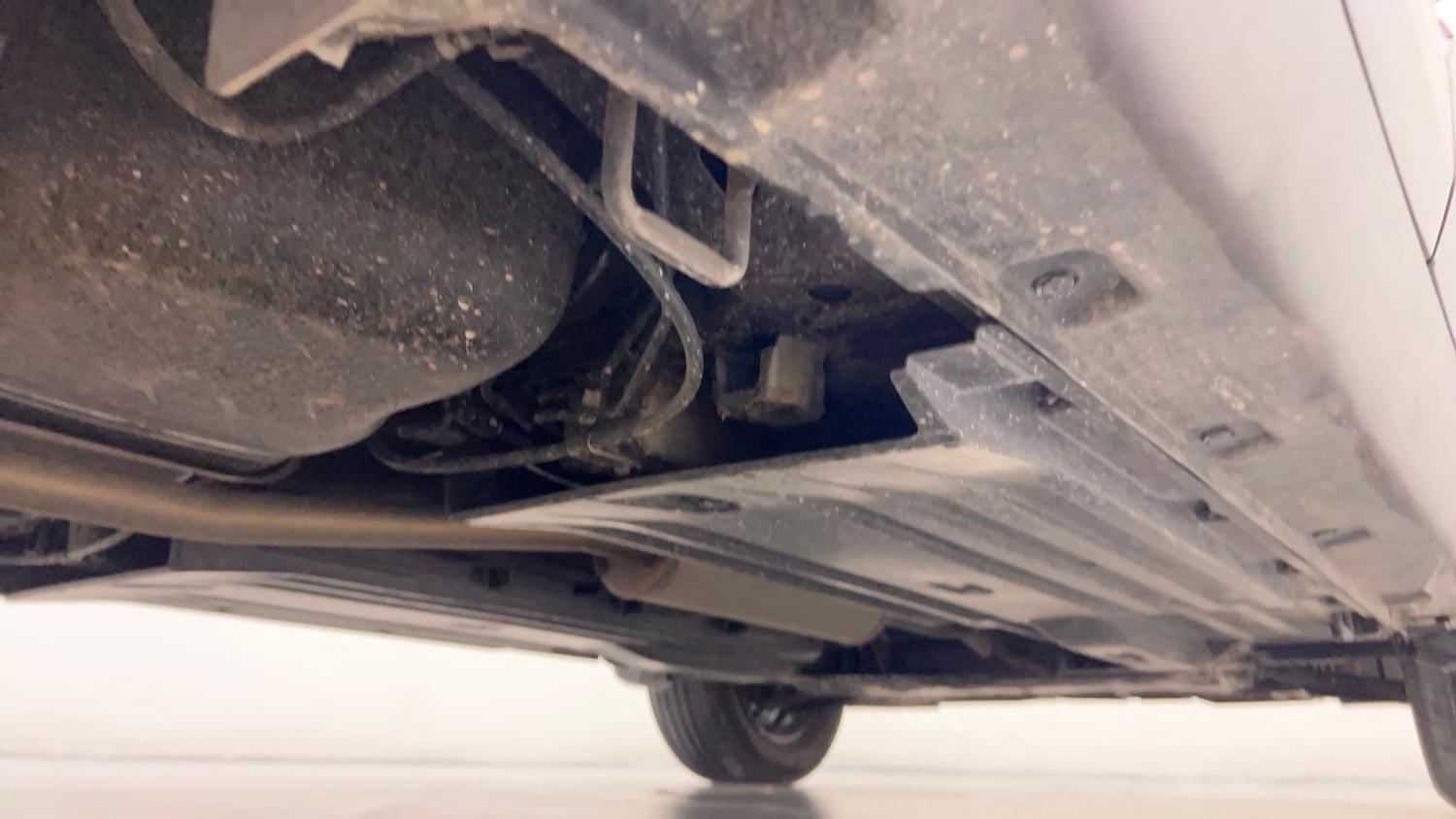 Used 2023 Maruti Suzuki Brezza Vxi AT Petrol Automatic extra REAR RIGHT UNDERBODY VIEW