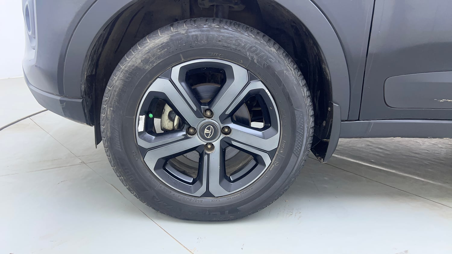Used 2023 Tata Nexon XZA Plus LUXS Red Dark Edition Petrol Automatic tyres LEFT FRONT TYRE RIM VIEW