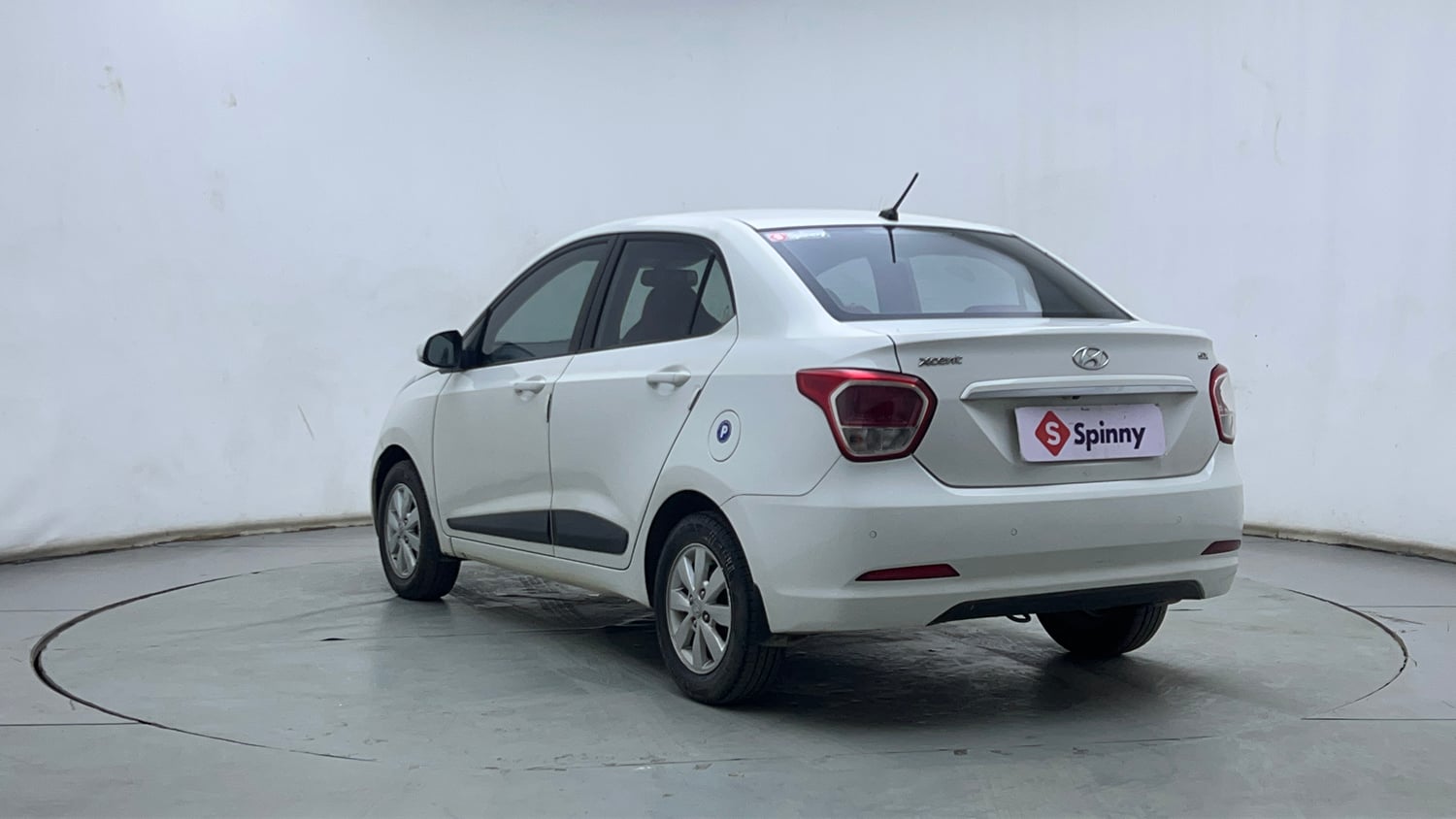 Used 2015 Hyundai Xcent SX 1.2 Petrol Manual exterior LEFT REAR CORNER VIEW