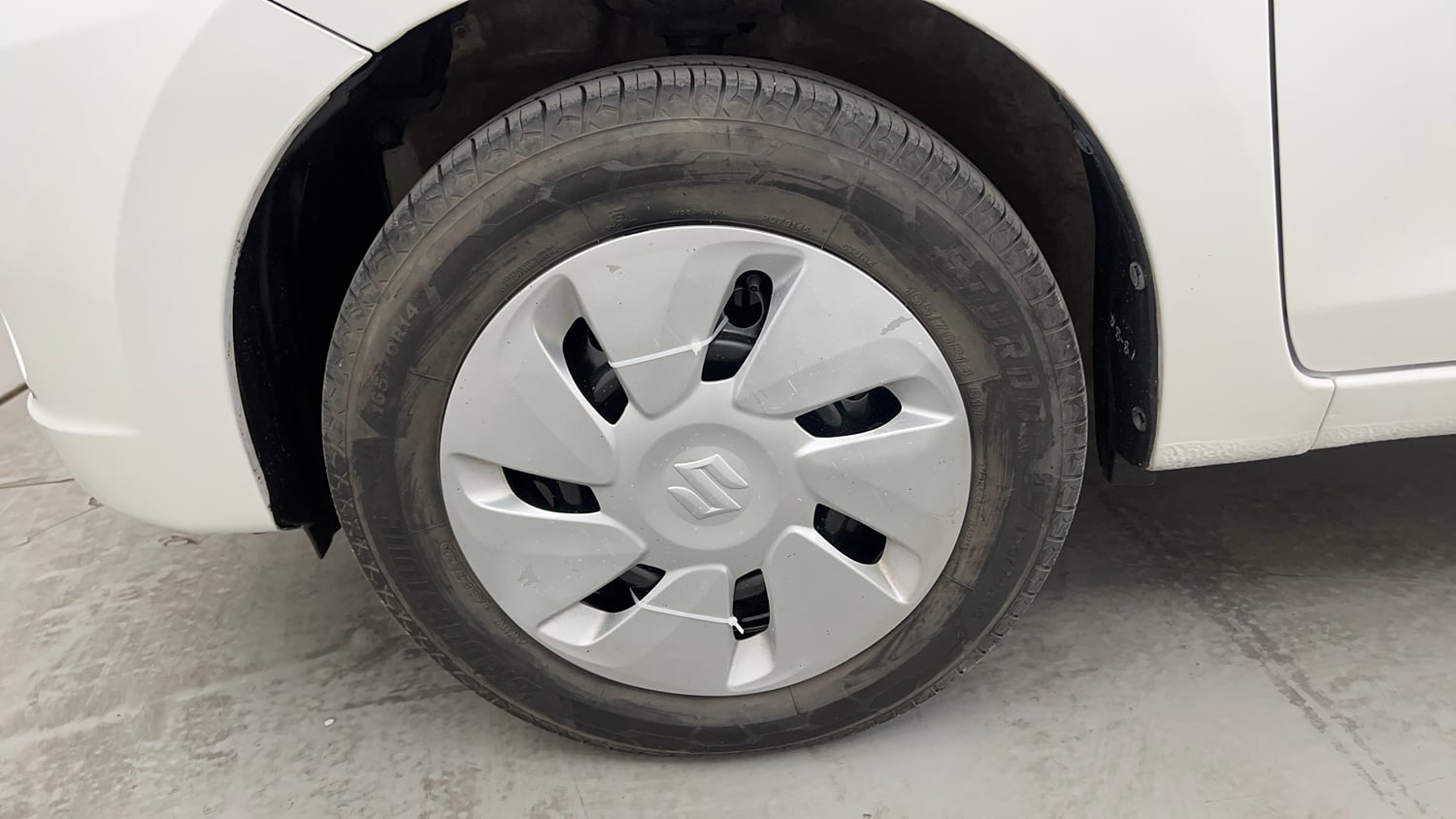 Used 2014 Maruti Suzuki Celerio VXi Petrol Manual tyres LEFT FRONT TYRE RIM VIEW