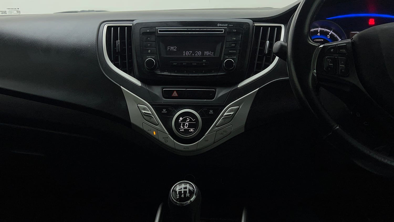 Used 2018 Maruti Suzuki Baleno Zeta 1.2 Petrol Manual interior MUSIC SYSTEM & AC CONTROL VIEW