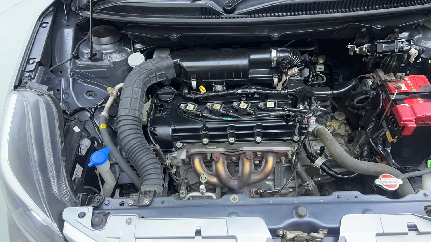 Used 2021 Maruti Suzuki Baleno Zeta Petrol Manual engine ENGINE RIGHT SIDE VIEW