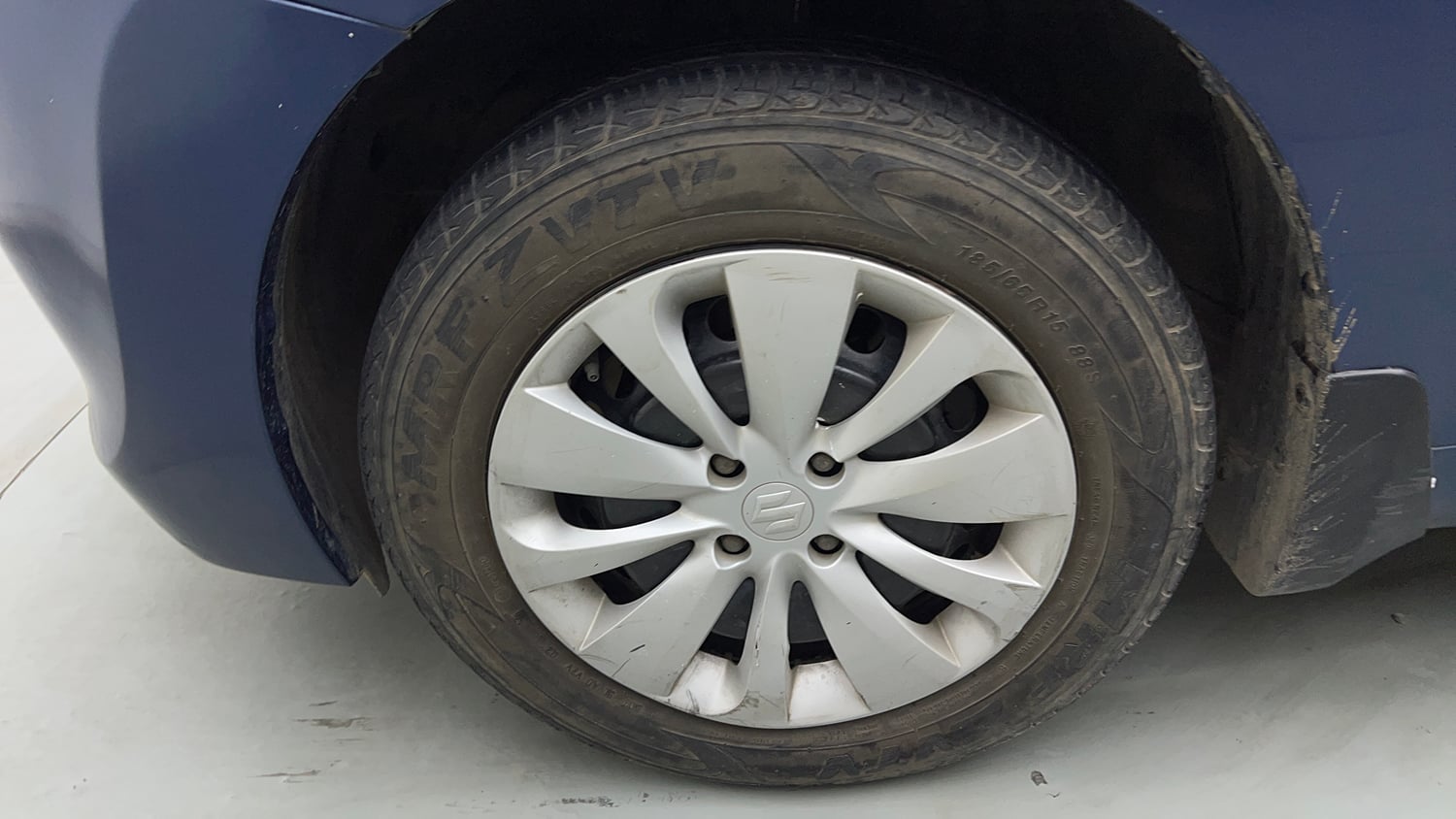 Used 2018 Maruti Suzuki Baleno Delta 1.2 Petrol Manual tyres LEFT FRONT TYRE RIM VIEW