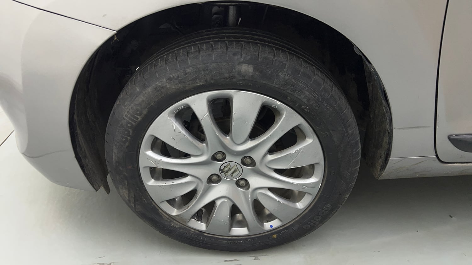 Used 2018 Maruti Suzuki Baleno Zeta 1.2 Petrol Manual tyres LEFT FRONT TYRE RIM VIEW
