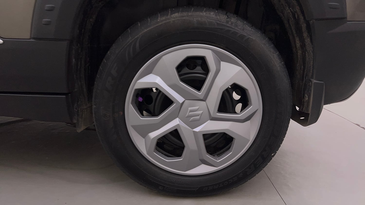 Used 2023 Maruti Suzuki Brezza Vxi AT Petrol Automatic tyres LEFT REAR TYRE RIM VIEW