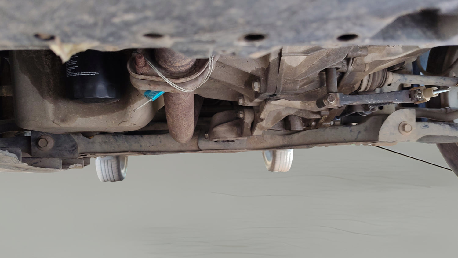 Used 2017 Maruti Suzuki Baleno Zeta 1.2 Petrol Manual extra FRONT LEFT UNDERBODY VIEW