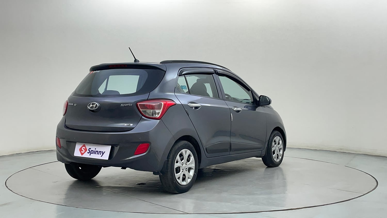 Used 2014 Hyundai Grand i10 Sportz 1.2 Kappa VTVT Petrol Manual exterior RIGHT REAR CORNER VIEW