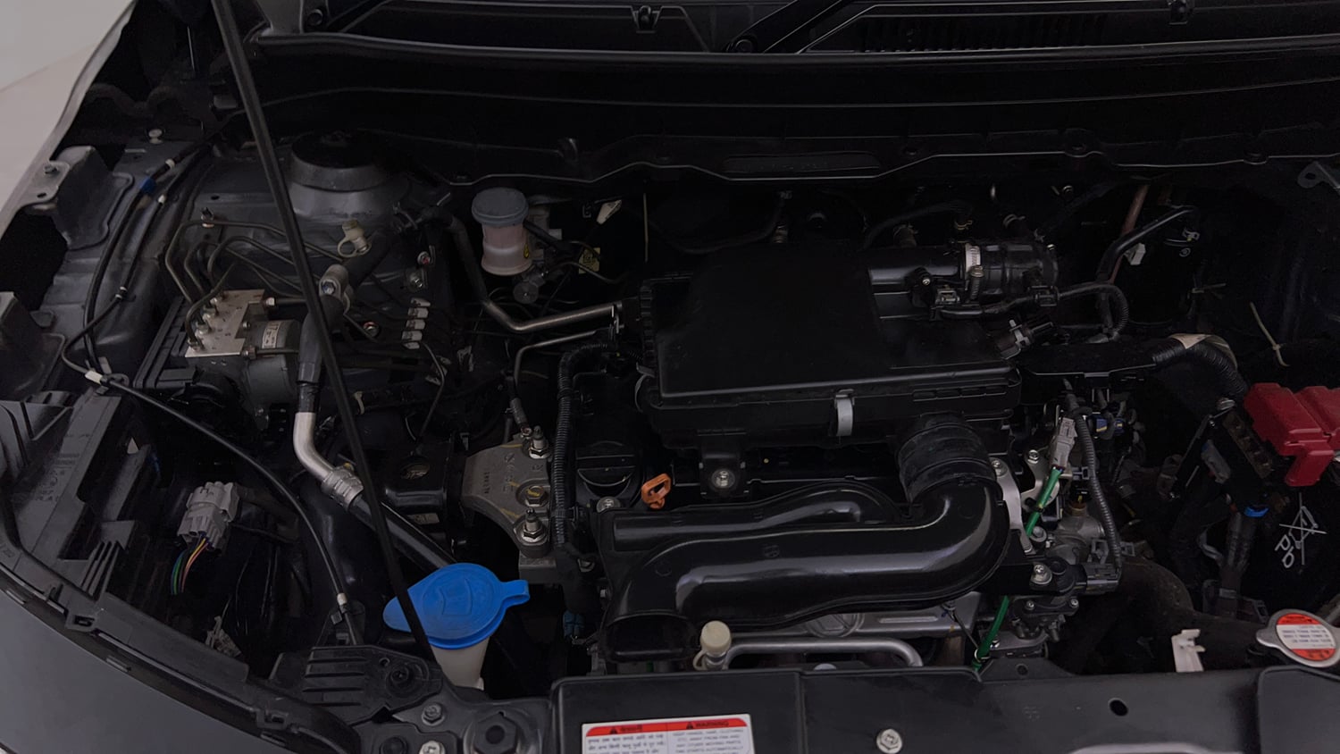Used 2023 Maruti Suzuki Brezza Vxi AT Petrol Automatic engine ENGINE RIGHT SIDE VIEW