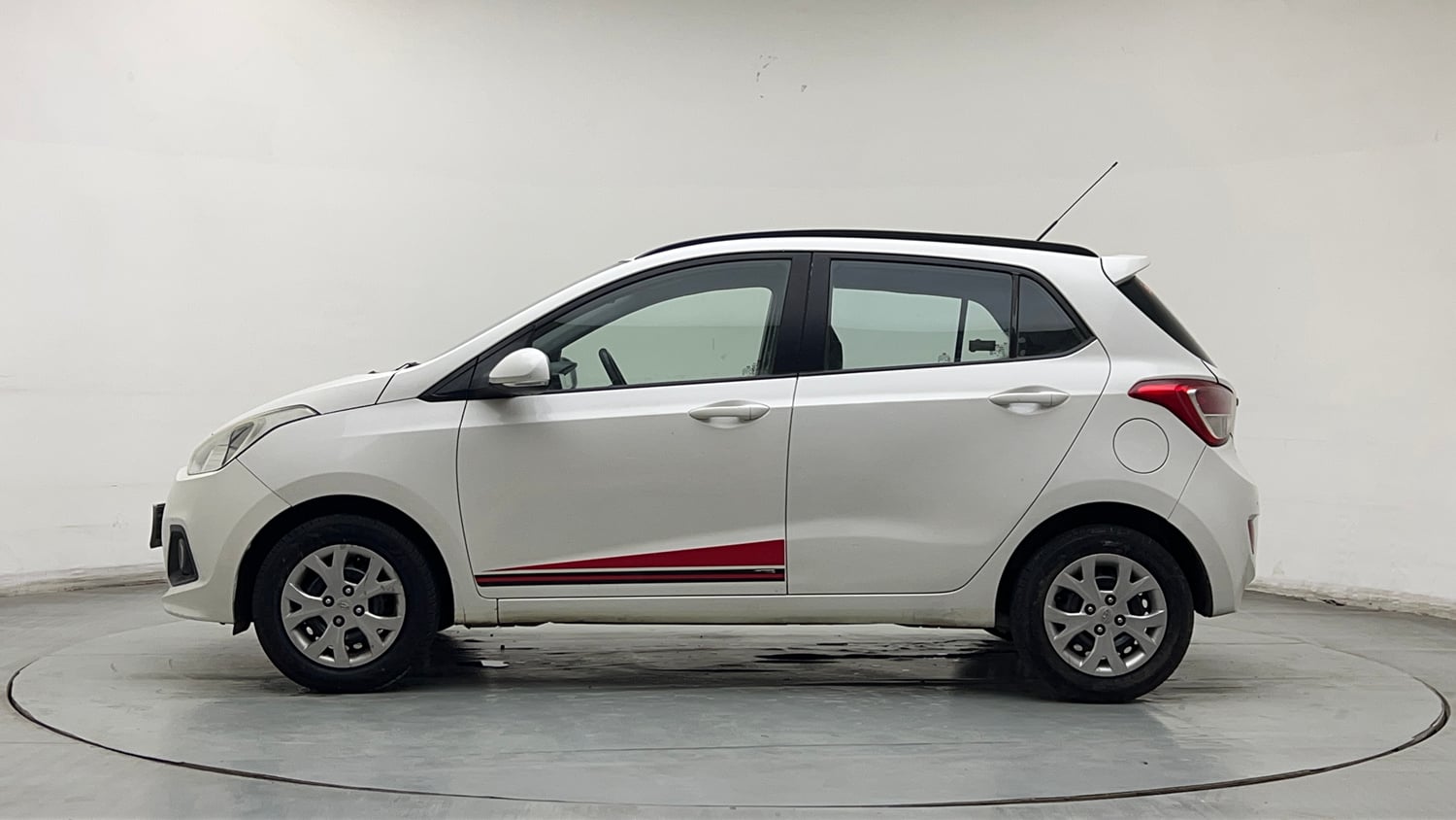 Used 2016 Hyundai Grand i10 Anniversary Edition Petrol Manual exterior LEFT SIDE VIEW