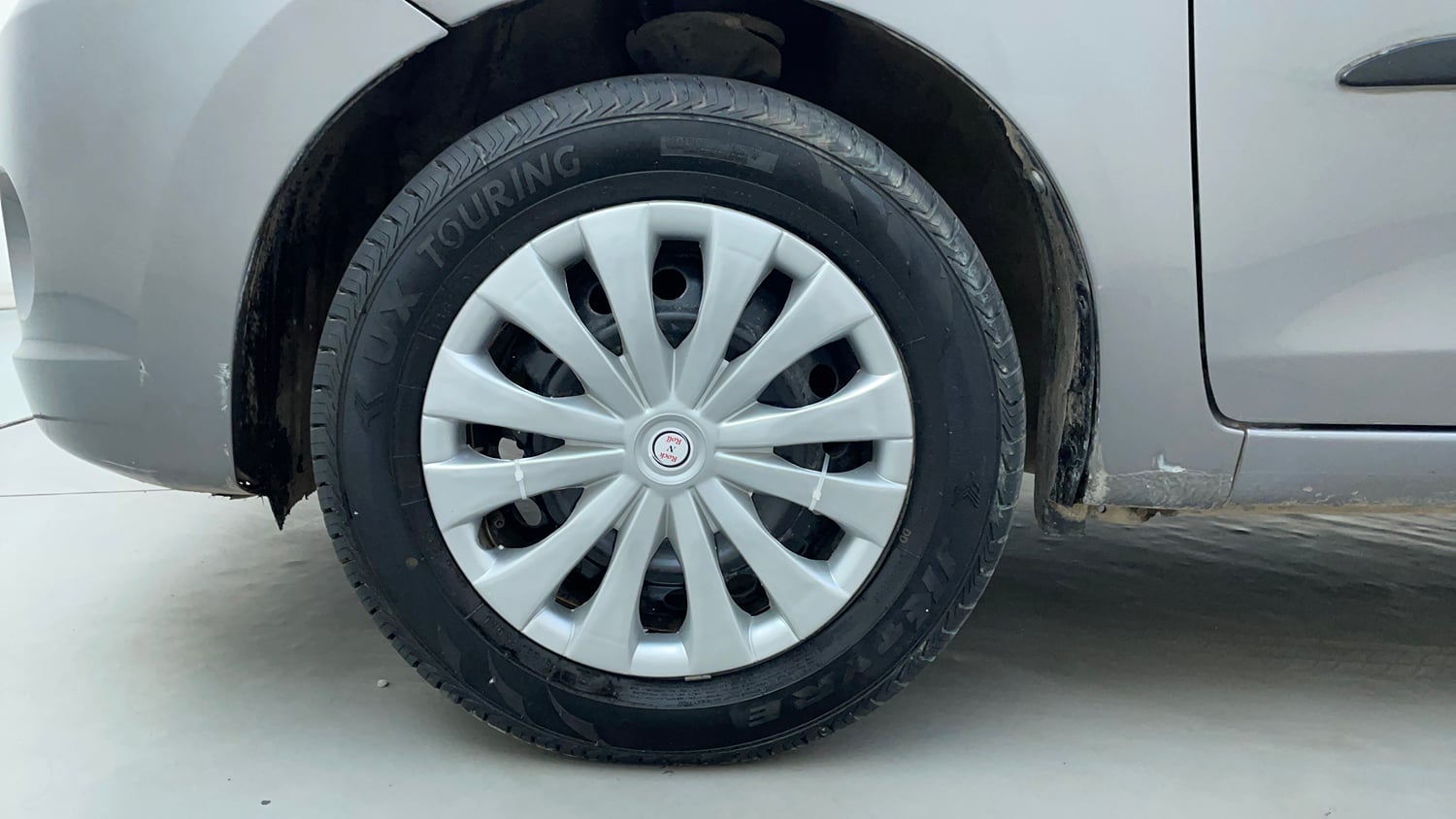 Used 2016 Maruti Suzuki Celerio ZXI (O) AMT Petrol Automatic tyres LEFT FRONT TYRE RIM VIEW