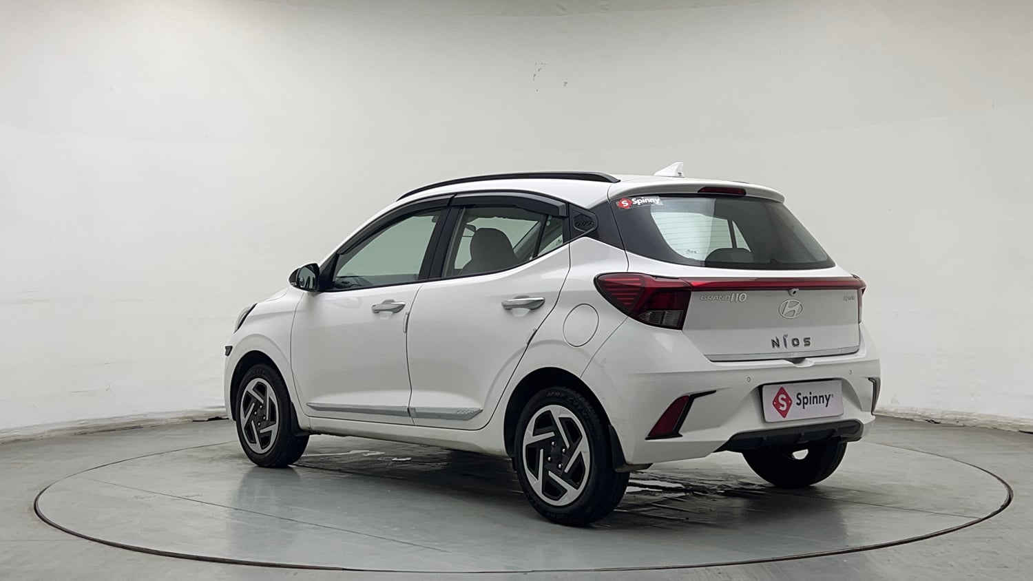 Used 2024 Hyundai Grand i10 Nios Sportz 1.2 Kappa VTVT Petrol Manual exterior LEFT REAR CORNER VIEW