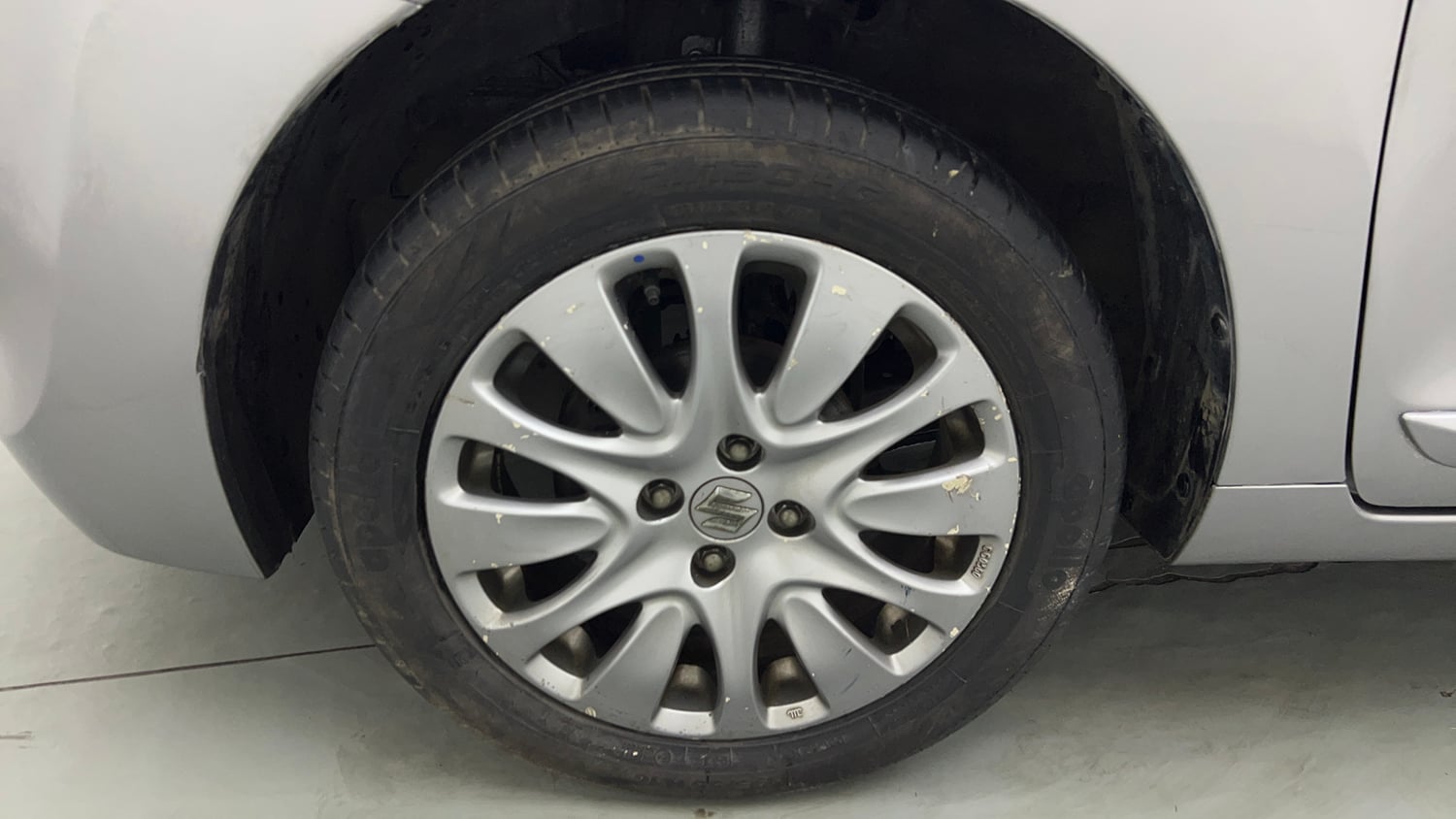 Used 2017 Maruti Suzuki Baleno Alpha 1.2 Petrol Manual tyres LEFT FRONT TYRE RIM VIEW