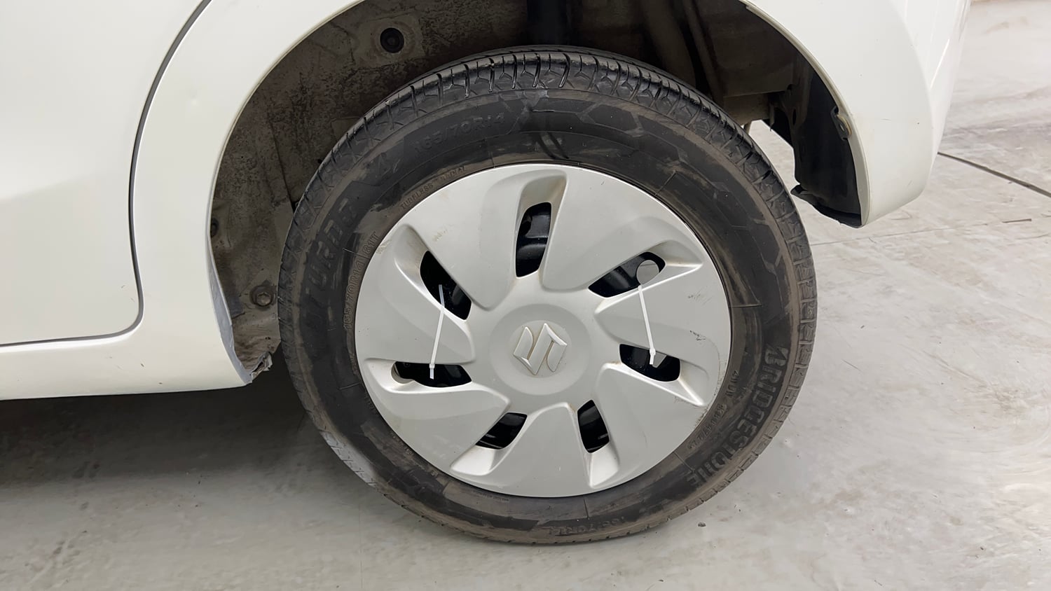 Used 2014 Maruti Suzuki Celerio VXi Petrol Manual tyres LEFT REAR TYRE RIM VIEW