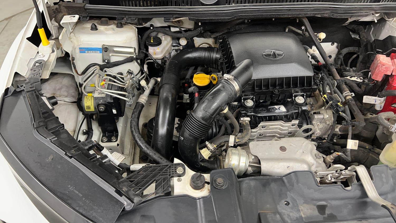 Used 2024 Tata Nexon Creative Plus S 1.2 Revotron Petrol 6AMT Petrol Automatic engine ENGINE RIGHT SIDE VIEW