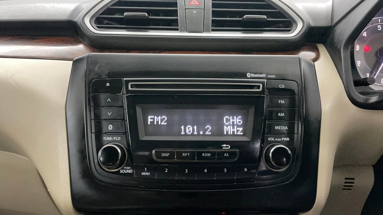 Used 2018 Maruti Suzuki Dzire VXi Petrol Manual top_features Integrated (in-dash) music system