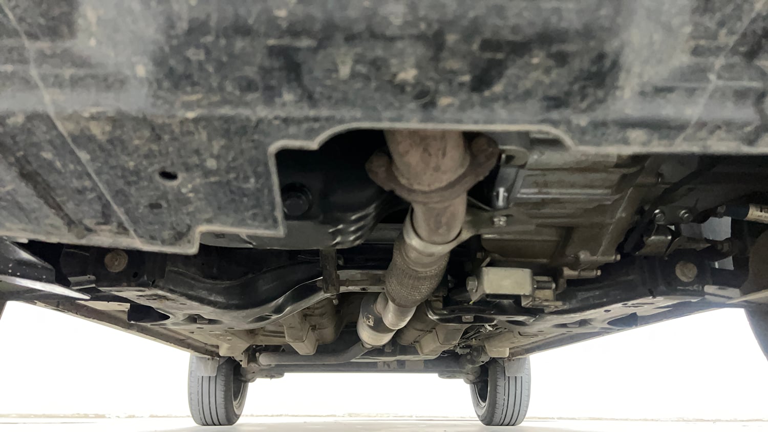 Used 2024 Tata Nexon Creative Plus S 1.2 Revotron Petrol 6AMT Petrol Automatic extra FRONT LEFT UNDERBODY VIEW