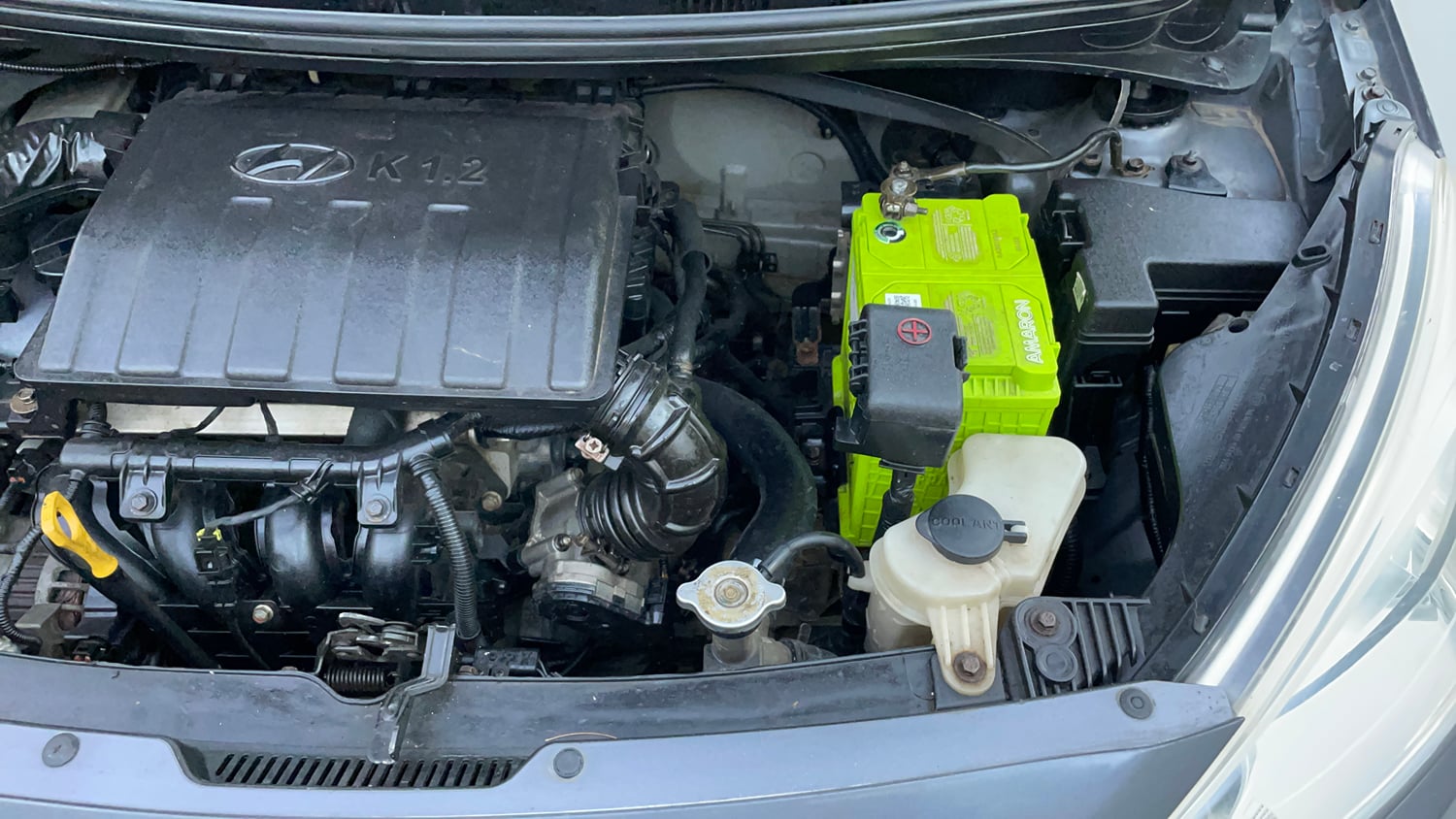 Used 2014 Hyundai Grand i10 Sportz 1.2 Kappa VTVT Petrol Manual engine ENGINE LEFT SIDE VIEW