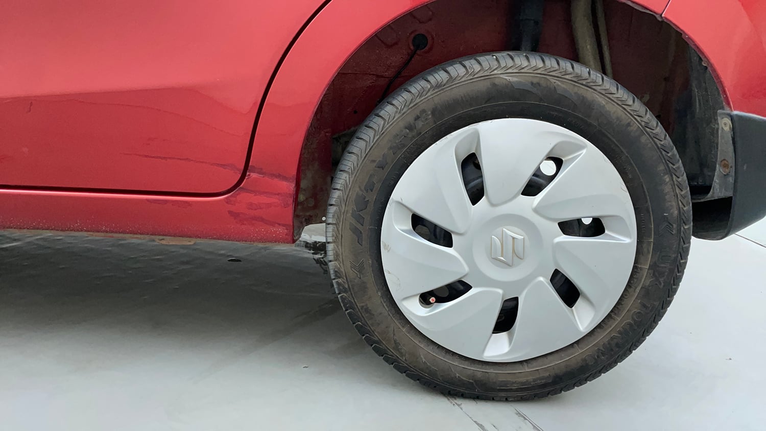 Used 2016 Maruti Suzuki Celerio VXI (O) AMT Petrol Automatic tyres LEFT REAR TYRE RIM VIEW