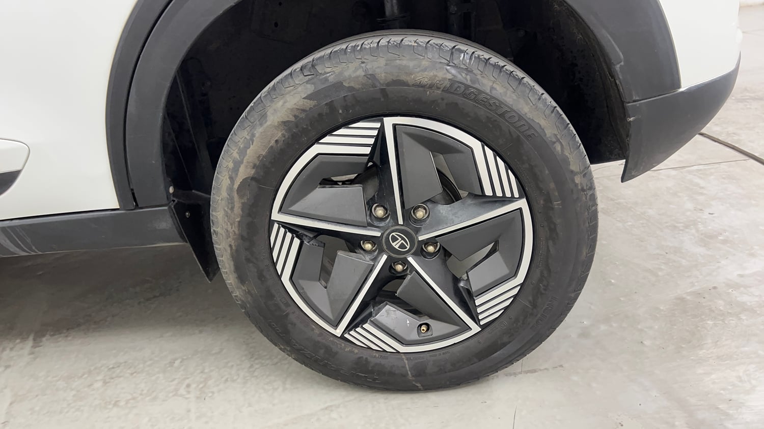 Used 2024 Tata Nexon Creative Plus S 1.2 Revotron Petrol 6AMT Petrol Automatic tyres LEFT REAR TYRE RIM VIEW