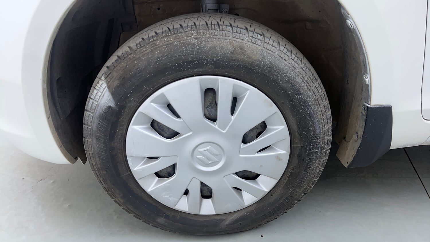 Used 2013 Maruti Suzuki Swift VXi Petrol Manual tyres LEFT FRONT TYRE RIM VIEW