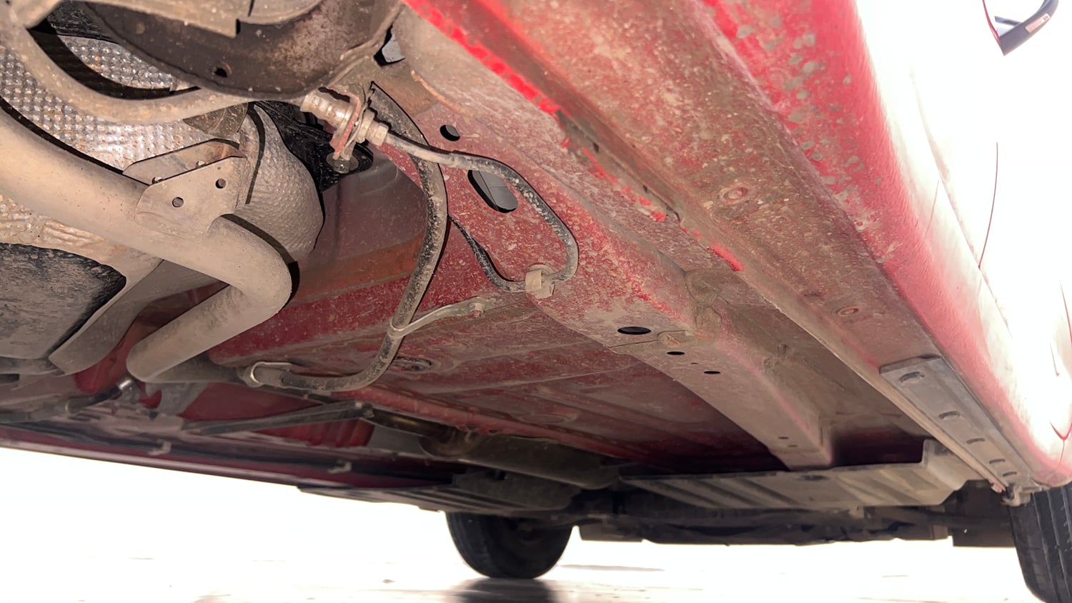 Used 2023 Maruti Suzuki Swift VXi AMT Petrol Automatic extra REAR RIGHT UNDERBODY VIEW