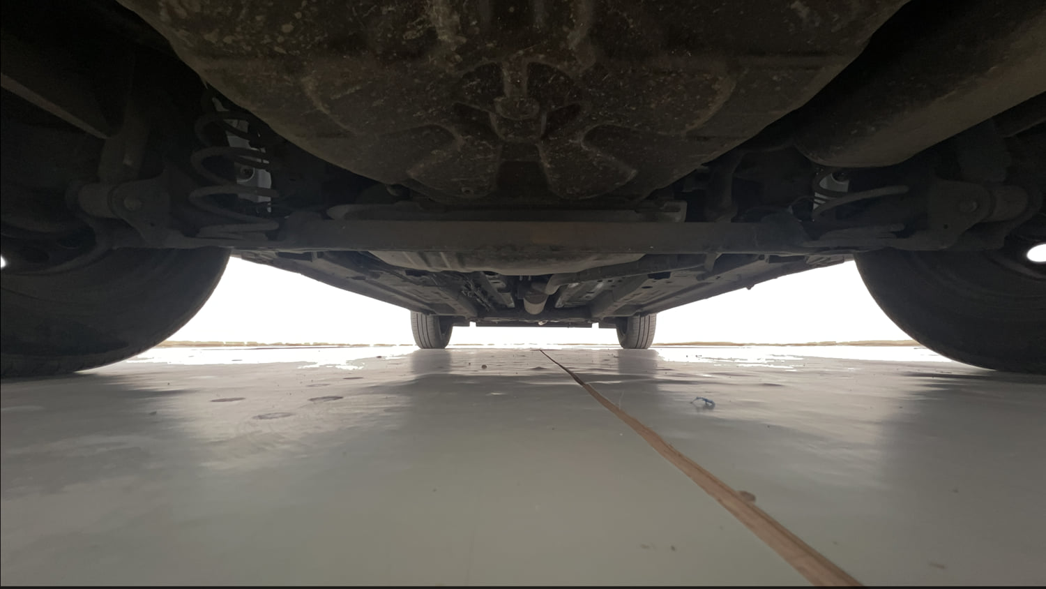 Used 2023 Tata Punch Camo Adventure Rhythm MT Petrol Manual extra REAR UNDERBODY VIEW (TAKEN FROM REAR)
